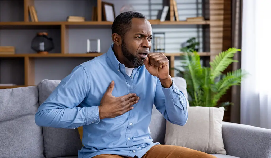 Man coughing