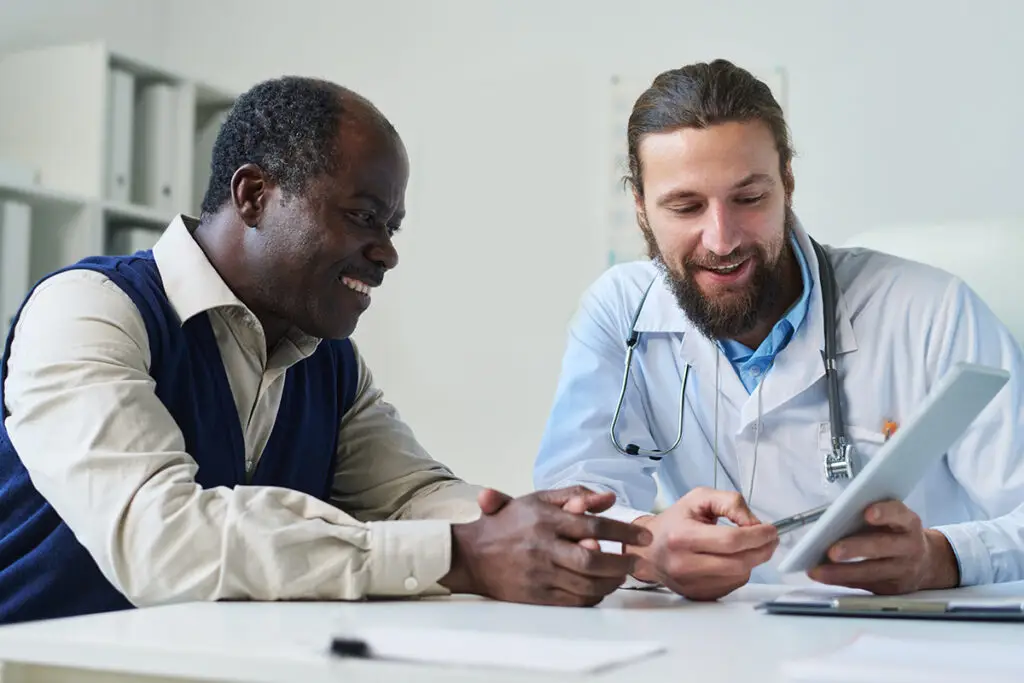 Doctor talking to patient