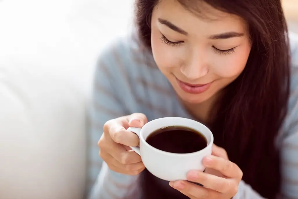Woman drinking coffee