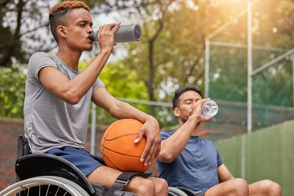 Basketball players drinking water