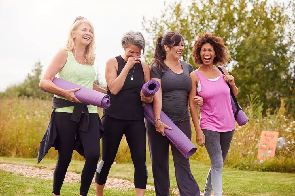 Women talking after exercising
