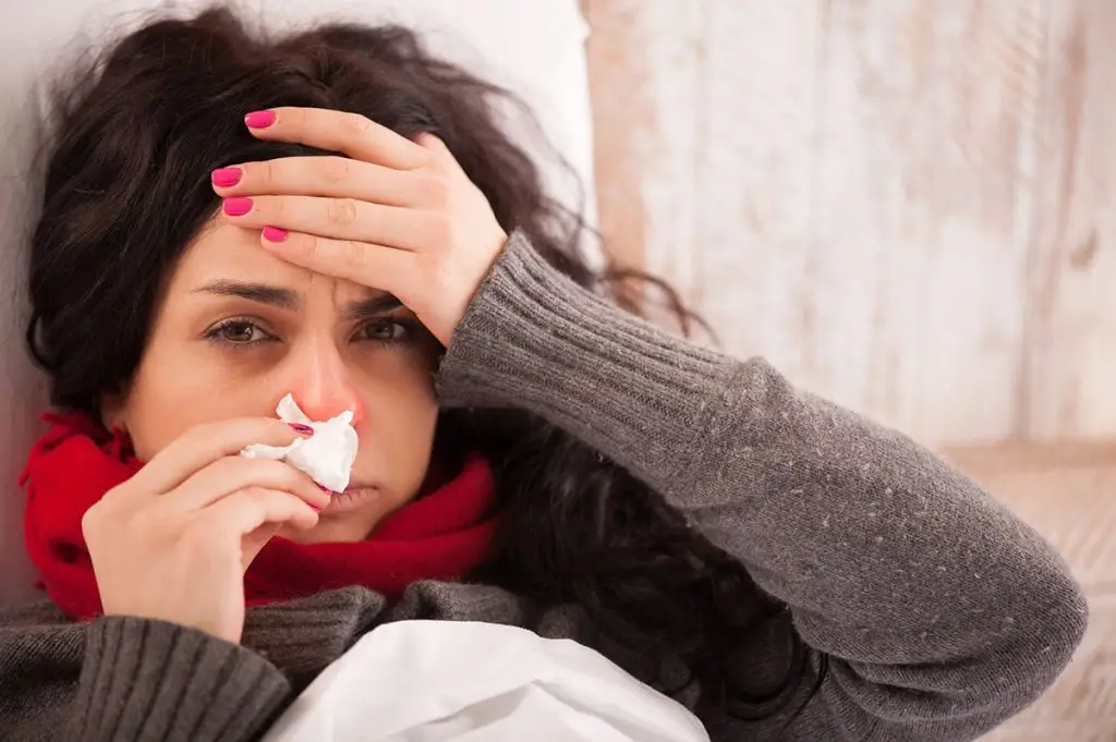 Woman sick with the flu