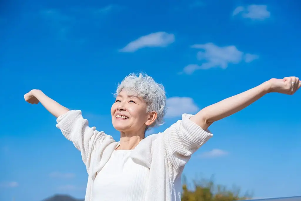Woman taking a deep breath