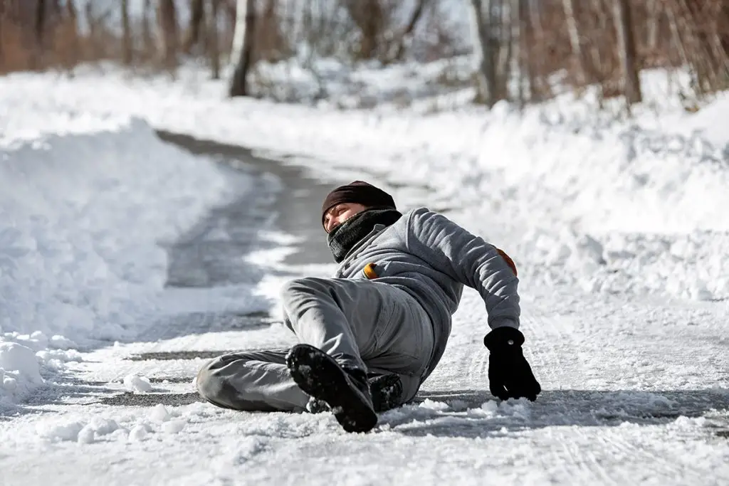 Man who has fallen down on the ice