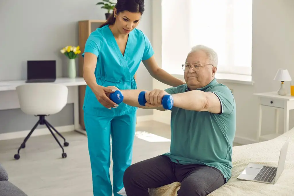 Man doing exercises with physical therapist