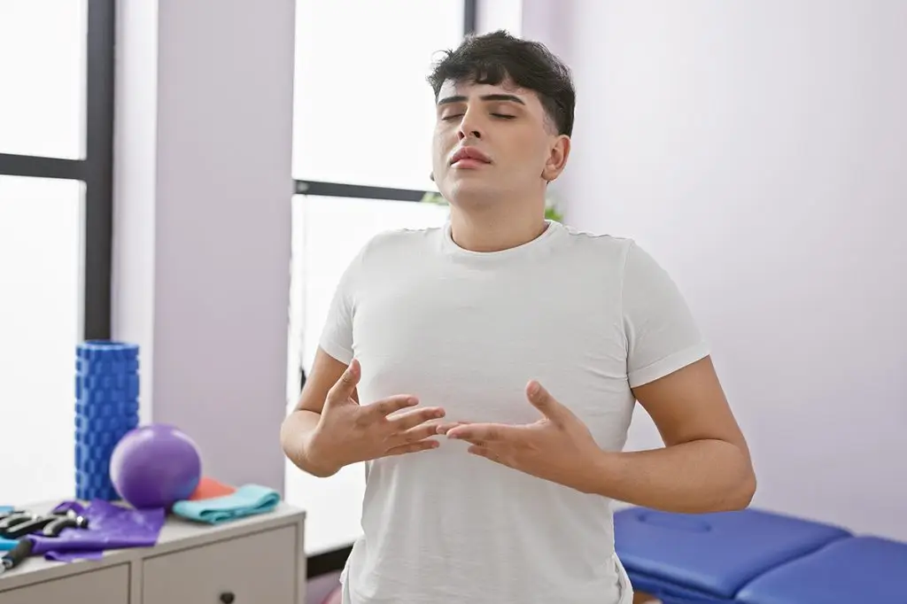 Man taking a deep breath