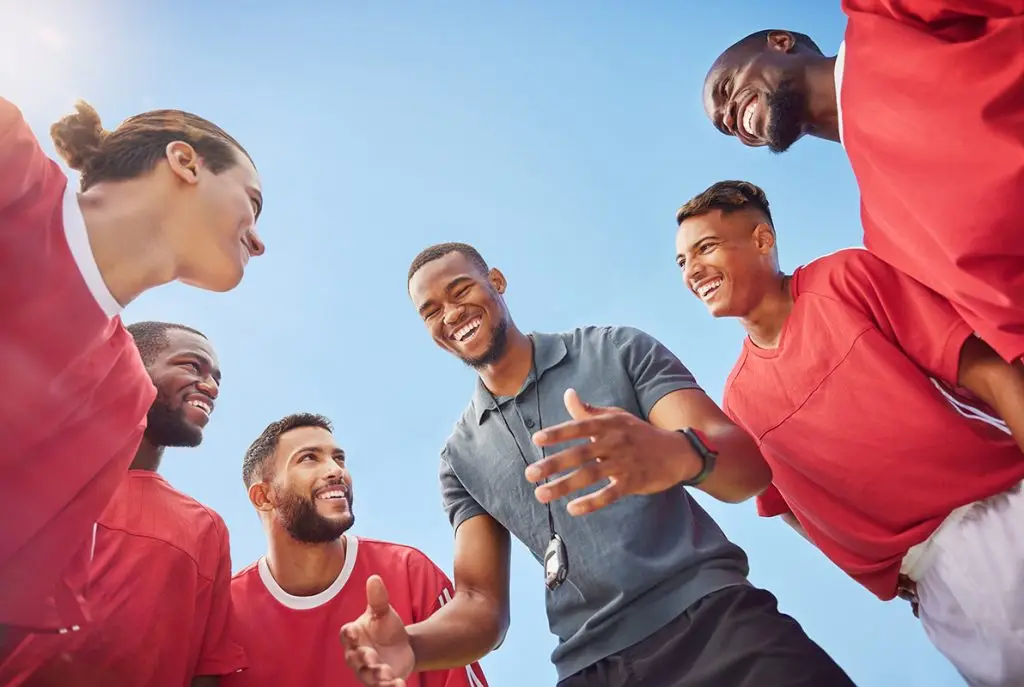 Coach talking to players