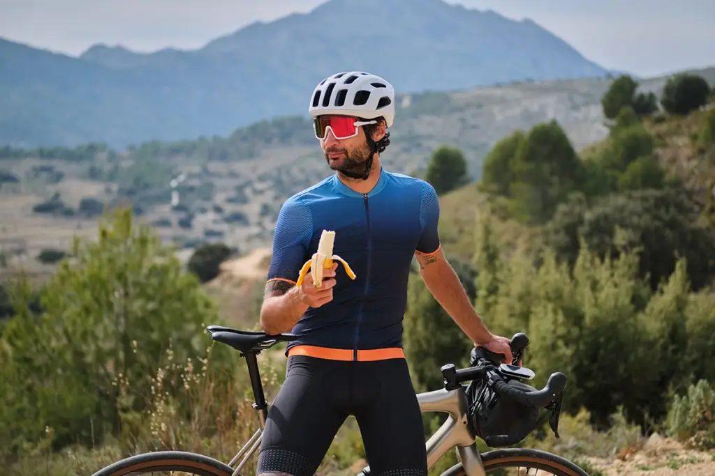 Biker eating a banana