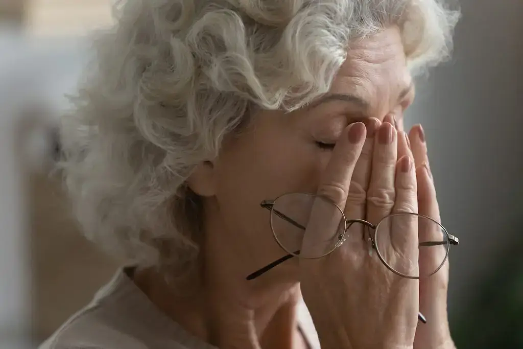 Older woman with headache