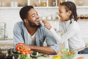 Dad little girl eating healthy