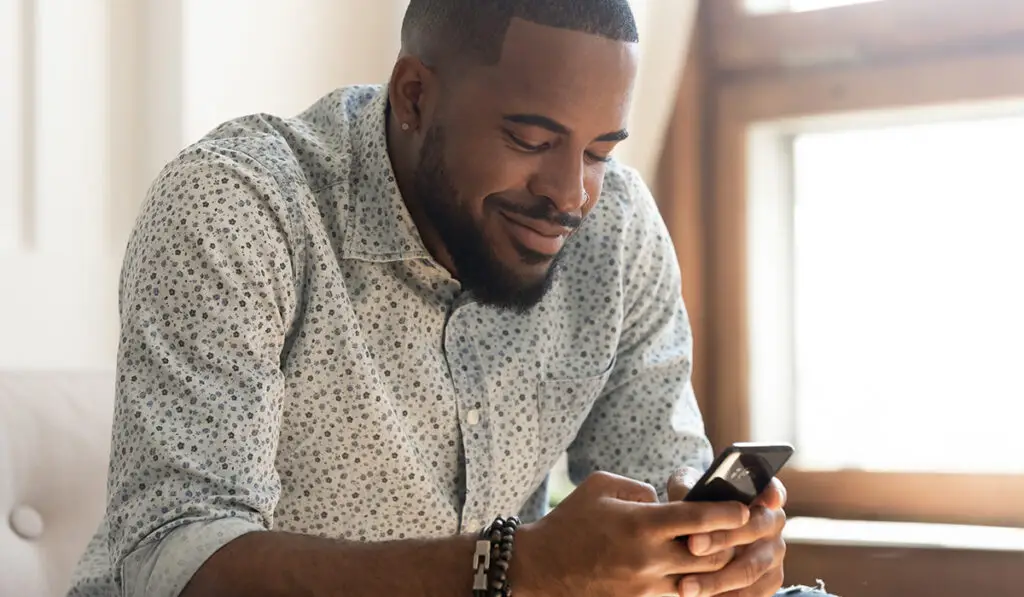 Man looking at cell phone