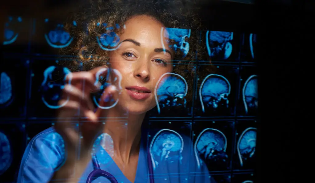 woman looking at xrays