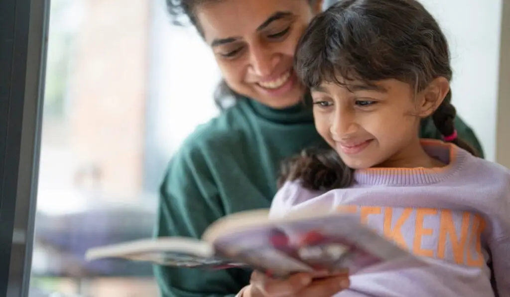 mother and daughter reading