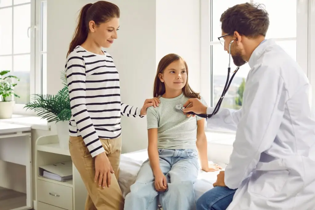 Girl,With,Her,Mother,In,Clinic,For,Medical,Checkup.,Male